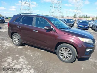 2011 Kia Sorento SX with VIN 5XYKW4A27BG163580, listed as a IAAI auction lot 41987362 with 172,097 mi miles. Bid and sale history available at carsss.com. Image 1.