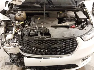 2021 Chrysler Pacifica Touring L with VIN 2C4RC1BG7MR531772, listed as a IAAI auction lot 41834392 with 156,123 mi miles and . Bid and sale history available at DreamBid. Image 10.