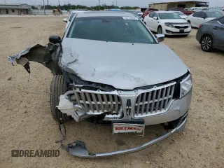 2011 Lincoln MKZ с VIN 3LNHL2GC7BR764304, выставлен на аукционе Copart как лот 55140005 с пробегом 128 062 миль миль и Списание • Salvage title. История ставок и продаж доступна на DreamBid. Изображение 5.