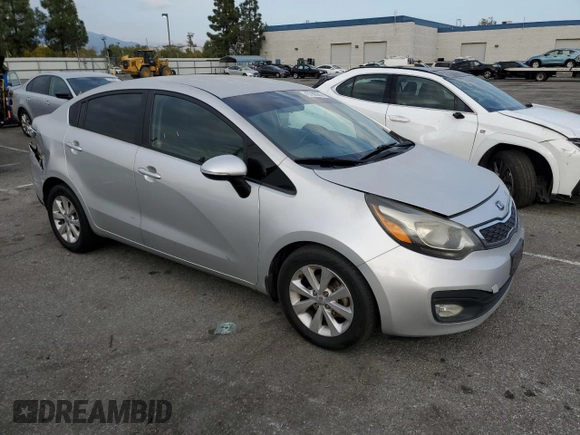 2014 Kia Rio EX z VIN KNADN4A30E6353469, wystawiony jako Copart lot #43788955 z przebiegiem 156 096 mil mil oraz Szkoda całkowita • Salvage title. Historia ofert i sprzedaży dostępna na DreamBid. Obrazek 4.