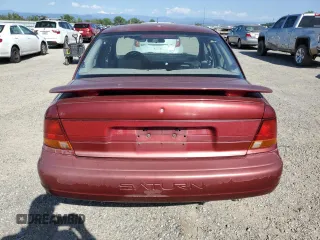 1996 Saturn SL with VIN 1G8ZK5278TZ334649, listed as a Copart auction lot 54098725 with 156,012 mi miles and Salvage Title. Bid and sale history available at carsss.com. Image 6.