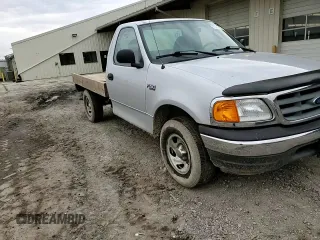 2004 Ford F-150 XL z VIN 2FTRF18274CA75519, wystawiony jako Copart lot #47450395 z przebiegiem 129 099 mil mil oraz Szkoda całkowita • Salvage title. Historia ofert i sprzedaży dostępna na DreamBid. Obrazek 11.
