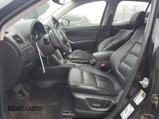 2013 Mazda CX-5 Grand Touring with VIN JM3KE4DE8D0161586, listed as a Copart auction lot 52641145 with 134,290 mi miles and Salvage Title. Bid and sale history available at carsss.com. Image 7.