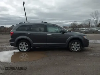 2014 Dodge Journey R/T z VIN 3C4PDDFG8ET127250, wystawiony jako IAAI lot #41920461 z przebiegiem Nie podano mil oraz . Historia ofert i sprzedaży dostępna na DreamBid. Obrazek 13.