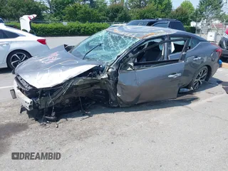 2017 Nissan Maxima S with VIN 1N4AA6AP3HC416012, listed as a IAAI auction lot 42390026 with 105,921 mi miles and . Bid and sale history available at DreamBid. Image 2.