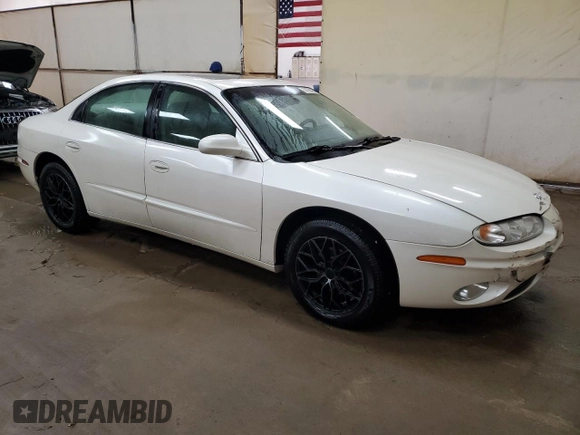 2003 Oldsmobile Aurora z VIN 1G3GS64C534171677, wystawiony jako Copart lot #74768254 z przebiegiem 113 932 mil mil oraz Tytuł czysty. Historia ofert i sprzedaży dostępna na DreamBid. Obrazek 4.