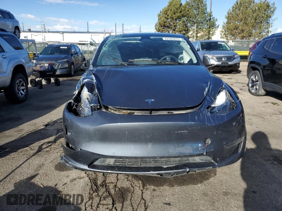 2022 Tesla Model Y Performance with VIN 7SAYGDEF0NF452111, listed as a Copart auction lot 47595975 with 33,514 mi miles and Salvage Title. Bid and sale history available at DreamBid. Image 5.