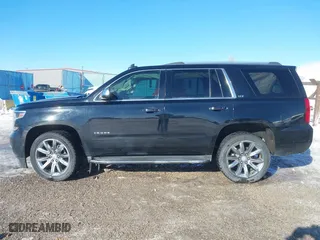 2016 Chevrolet Tahoe LTZ with VIN 1GNSKCKC7GR420945, listed as a IAAI auction lot 41414565 with 134,465 mi miles. Bid and sale history available at carsss.com. Image 14.