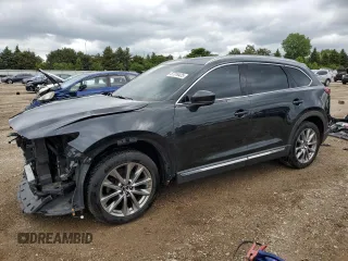 2019 Mazda CX-9 Signature with VIN JM3TCBEY2K0321823, listed as a Copart auction lot 57318425 with 84,271 mi miles and Salvage title. Bid and sale history available at DreamBid. Image 1.