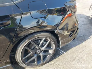 2024 Honda Civic Si z VIN 2HGFE1E57RH471112, wystawiony jako IAAI lot #41981451 z przebiegiem 18 393 mil mil oraz . Historia ofert i sprzedaży dostępna na DreamBid. Obrazek 6.