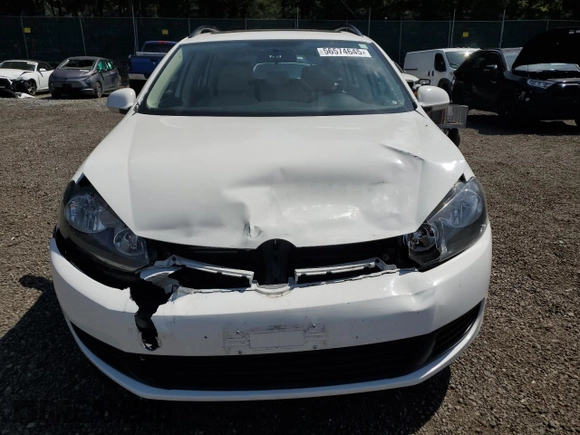 2012 Volkswagen Jetta TDI with VIN 3VWPL7AJ3CM639963, listed as a Copart auction lot 56574645 with 54,633 mi miles and Salvage title. Bid and sale history available at DreamBid. Image 5.