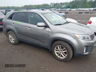 2014 Kia Sorento LX with VIN 5XYKTDA7XEG477409, listed as a IAAI auction lot 42350867 with 162,277 mi miles and . Bid and sale history available at DreamBid. Image 1.