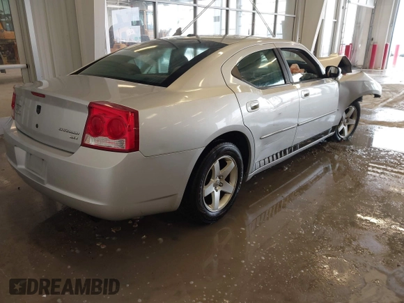 2010 Dodge Charger SXT with VIN 2B3CA3CV1AH291075, listed as a IAAI auction lot 41576216 with 144,602 mi miles. Bid and sale history available at carsss.com. Image 4.