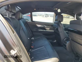 2018 BMW 7 Series 740i with VIN WBA7E2C59JG742809, listed as a Copart auction lot 66995934 with 62,017 mi miles and Salvage Title. Bid and sale history available at carsss.com. Image 10.