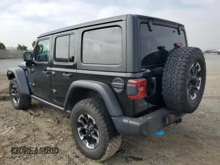 2024 Jeep Wrangler Rubicon z VIN 1C4RJXR6XRW291900, wystawiony jako Copart lot #61682885 z przebiegiem Nie podano mil oraz Szkoda całkowita • Salvage title. Historia ofert i sprzedaży dostępna na DreamBid. Obrazek 2.