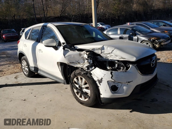 2014 Mazda CX-5 Sport with VIN JM3KE2BEXE0332590, listed as a Copart auction lot 87534365 with Not Provided miles and Salvage Title. Bid and sale history available at carsss.com. Image 4.