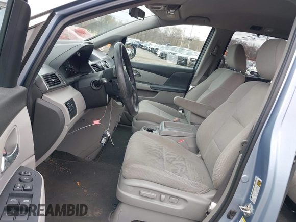 2014 Honda Odyssey EX with VIN 5FNRL5H46EB016800, listed as a IAAI auction lot 42048768 with 144,677 mi miles and . Bid and sale history available at carsss.com. Image 5.