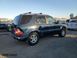 1999 Mercedes-Benz M-Class with VIN 4JGAB54E2XA106113, listed as a Copart auction lot 87996015 with 214,572 mi miles and Salvage Title. Bid and sale history available at carsss.com. Image 3.