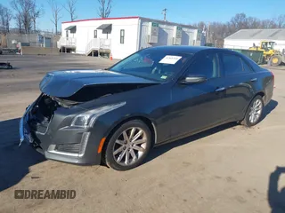 2014 Cadillac CTS Luxury RWD with VIN 1G6AR5SX0E0180611, listed as a IAAI auction lot 41366268 with 122,040 mi miles. Bid and sale history available at carsss.com. Image 2.