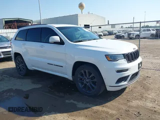 2018 Jeep Grand Cherokee High Altitude z VIN 1C4RJECGXJC228257, wystawiony jako IAAI lot #40569642 z przebiegiem 95 472 mil mil oraz . Historia ofert i sprzedaży dostępna na DreamBid. Obrazek 1.