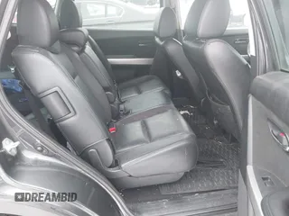 2014 Mazda CX-9 Grand Touring with VIN JM3TB3DV9E0440506, listed as a IAAI auction lot 41537718 with 217,299 mi miles and . Bid and sale history available at DreamBid. Image 8.