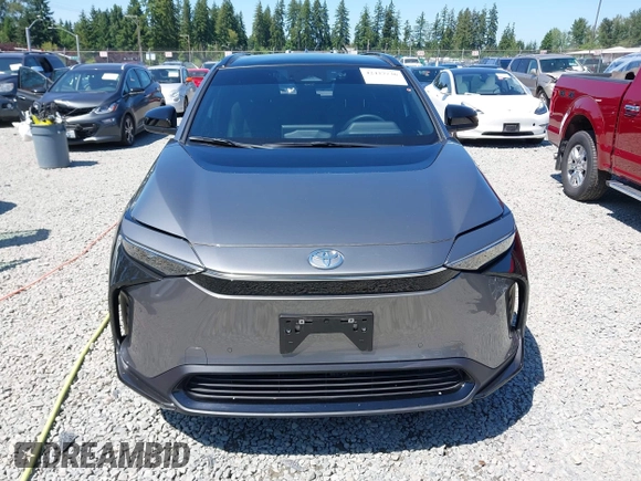 2024 Toyota bZ4X XLE z VIN JTMABACA5RA070254, wystawiony jako IAAI lot #42427736 z przebiegiem 5 718 mil mil oraz . Historia ofert i sprzedaży dostępna na DreamBid. Obrazek 12.