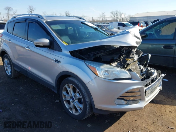 2015 Ford Escape Titanium with VIN 1FMCU0J93FUC02844, listed as a IAAI auction lot 41531293 with 115,392 mi miles and . Bid and sale history available at DreamBid. Image 1.
