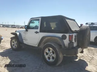 2014 Jeep Wrangler Sahara with VIN 1C4AJWBGXEL214269, listed as a Copart auction lot 47678045 with 283,634 mi miles and Clean Title. Bid and sale history available at DreamBid. Image 2.