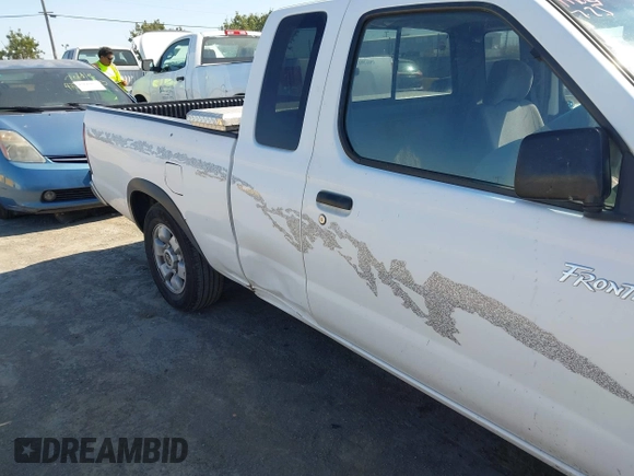 1999 Nissan Frontier XE with VIN 1N6DD26S1XC324221, listed as a IAAI auction lot 42814722 with 308,599 mi miles and . Bid and sale history available at DreamBid. Image 12.
