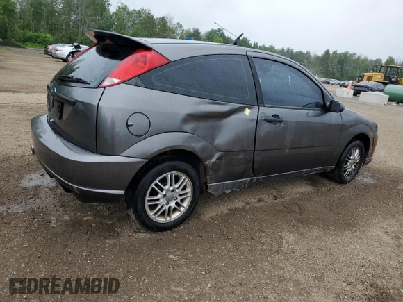 2007 Ford Focus S with VIN 1FAFP31N37W317625, listed as a Copart auction lot 61531315 with 230,530 mi miles and Clean title. Bid and sale history available at DreamBid. Image 3.