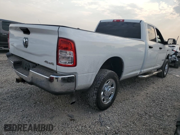 2021 Ram 2500 Tradesman with VIN 3C6UR5HJXMG607601, listed as a Copart auction lot 66101514 with 104,715 mi miles and Salvage Title. Bid and sale history available at carsss.com. Image 3.