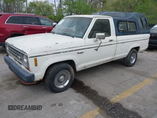 1985 Ford Ranger with VIN 1FTCR10S8FUA23702, listed as a IAAI auction lot 42017521 with 12,320 mi miles and . Bid and sale history available at DreamBid. Image 2.