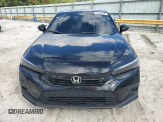 2023 Honda Civic Sedan Sport with VIN 2HGFE2F56PH515599, listed as a Copart auction lot 86490774 with 43,935 mi miles and Salvage Title. Bid and sale history available at carsss.com. Image 5.