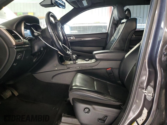 2015 Jeep Grand Cherokee Summit with VIN 1C4RJFJM9FC711776, listed as a Copart auction lot 84464454 with 94,637 mi miles and Salvage Title. Bid and sale history available at carsss.com. Image 7.