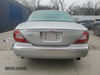2004 Jaguar XJ with VIN SAJEA74C64SG08121, listed as a Copart auction lot 81736984 with 100,144 mi miles and Non Repairable. Bid and sale history available at DreamBid. Image 6.