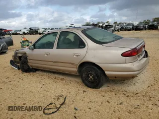 1998 Ford Contour z VIN 1FAFP65L6WK252432, wystawiony jako Copart lot #78490084 z przebiegiem Nie podano mil oraz Szkoda całkowita • Salvage title. Historia ofert i sprzedaży dostępna na DreamBid. Obrazek 2.