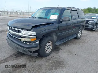 2005 Chevrolet Tahoe LS with VIN 1GNEC13V35R263104, listed as a IAAI auction lot 41918482 with 208,520 mi miles and . Bid and sale history available at DreamBid. Image 2.