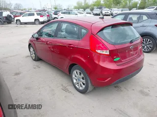 2013 Ford Fiesta SE with VIN 3FADP4EJXDM152463, listed as a IAAI auction lot 42122969 with 66,952 mi miles and . Bid and sale history available at DreamBid. Image 3.