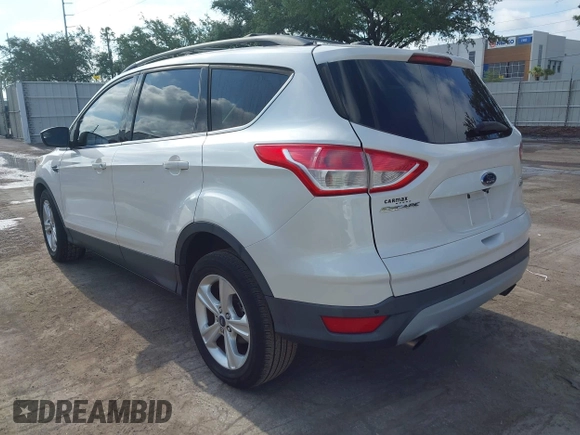 2014 Ford Escape SE with VIN 1FMCU0GX2EUA02753, listed as a IAAI auction lot 42191334 with 205,289 mi miles. Bid and sale history available at carsss.com. Image 3.