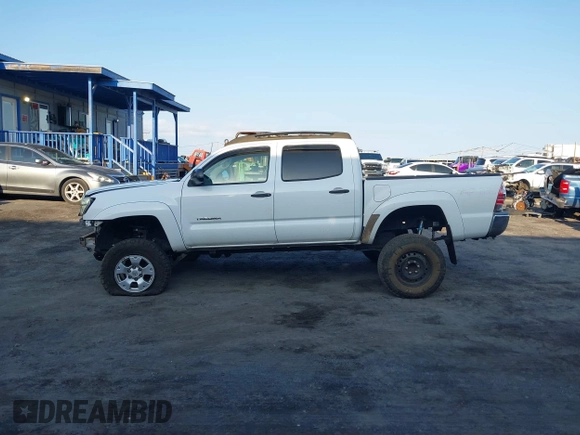 2014 Toyota Tacoma with VIN 5TFLU4EN7EX091618, listed as a IAAI auction lot 41774286 with Not Provided miles and . Bid and sale history available at DreamBid. Image 14.