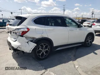 2018 BMW X1 xDrive28i with VIN WBXHT3C35J5L26952, listed as a Copart auction lot 51715035 with 63,306 mi miles and Salvage Title. Bid and sale history available at carsss.com. Image 3.