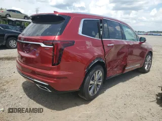 2025 Cadillac XT6 AWD Premium Luxury z VIN 1GYKPDRS1SZ128403, wystawiony jako Copart lot #58776065 z przebiegiem 121 mil mil oraz Czysty tytuł • Clean title. Historia ofert i sprzedaży dostępna na DreamBid. Obrazek 3.