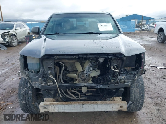2013 Toyota Tacoma with VIN 3TMLU4EN7DM113315, listed as a IAAI auction lot 41938415 with 228,912 mi miles and . Bid and sale history available at DreamBid. Image 13.