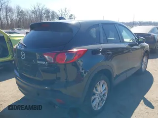2014 Mazda CX-5 Grand Touring with VIN JM3KE4DY1E0339690, listed as a IAAI auction lot 41668780 with 216,825 mi miles. Bid and sale history available at carsss.com. Image 4.