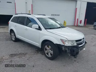 2012 Dodge Journey SXT with VIN 3C4PDCBG3CT331693, listed as a IAAI auction lot 42624751 with 165,480 mi miles and . Bid and sale history available at DreamBid. Image 1.