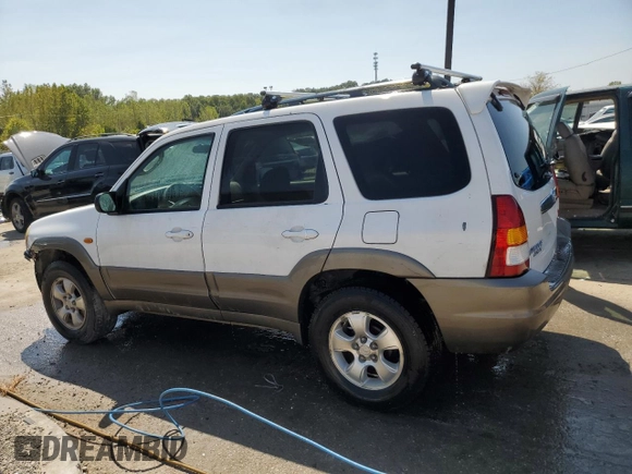 2002 Mazda Tribute LX with VIN 4F2YU09132KM10219, listed as a Copart auction lot 70619724 with 202,687 mi miles and Salvage Title. Bid and sale history available at carsss.com. Image 2.