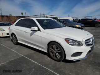 2015 Mercedes-Benz E-Class E 250 BlueTEC Luxury with VIN WDDHF0EB2FB096194, listed as a Copart auction lot 43168715 with 216,083 mi miles and Salvage Title. Bid and sale history available at carsss.com. Image 4.