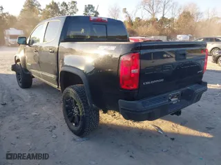 2021 Chevrolet Colorado 4WD ZR2 with VIN 1GCGTEEN7M1111068, listed as a IAAI auction lot 41335634 with 96,261 mi miles. Bid and sale history available at carsss.com. Image 3.