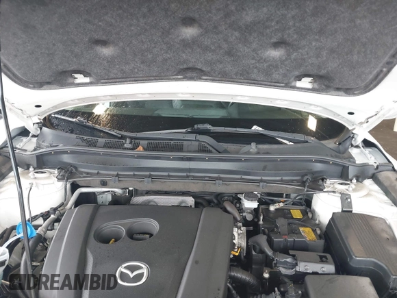 2019 Mazda CX-5 Grand Touring with VIN JM3KFBDMXK0648813, listed as a IAAI auction lot 42524680 with 23,521 mi miles and . Bid and sale history available at DreamBid. Image 10.