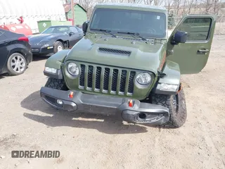 2023 Jeep Gladiator Mojave with VIN 1C6JJTEG6PL564504, listed as a IAAI auction lot 41752685 with 20,430 mi miles and . Bid and sale history available at DreamBid. Image 6.